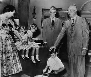Dwight Eisenhower and Leverett Saltonstall and Eisenhower`s family (David Eisenhower, Barbara Ann Eisenhower, Susan Eisenhower and Mamie Eisenhower) Black and white photograph